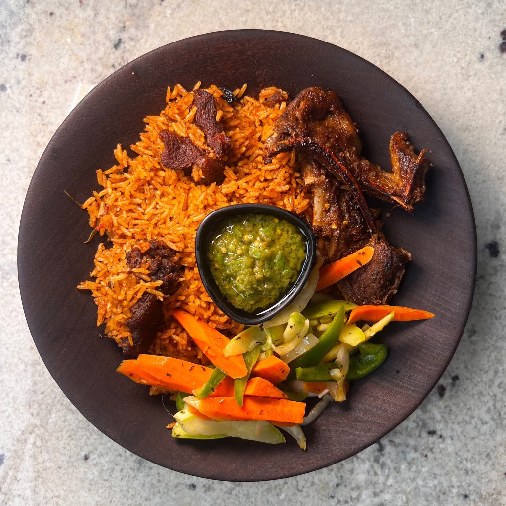 Goat Jollof with tender lamb chops. from Buka